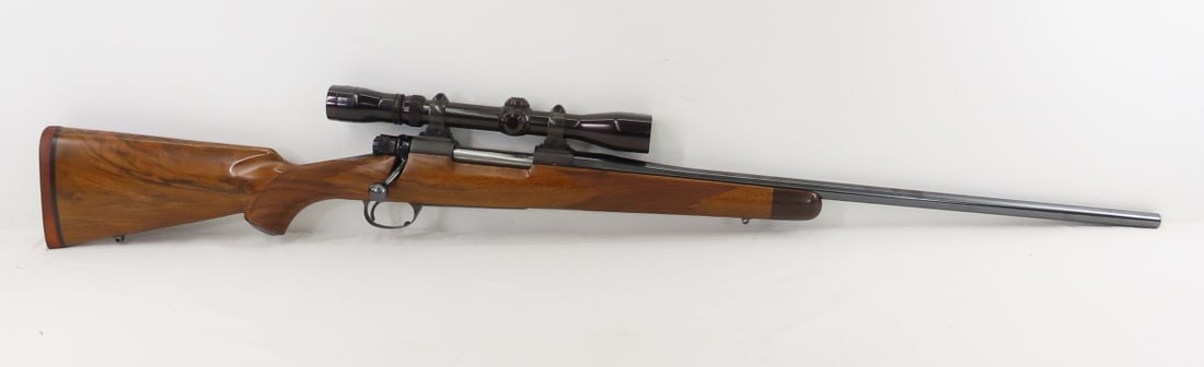 Kimber M89 BGR 7mm REM MAG Rifle with Scope: Kimber M89 BGR 7mm REM MAG Rifle with Scope - SN# SGC203, bolt action, Controlled Round Feed (CRF) , 24" barrel, checkered wood pistol grip stock with recoil pad and sling swivel mounts, MFG 1989-1991