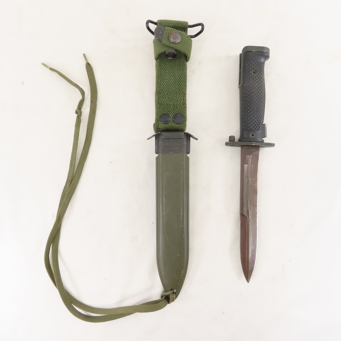 US M5A1 Bayonet in German USMA81 Scabbard: US M5A1 Bayonet in German USMA81 Scabbard - Guard is marked USM5A1 and Blade is marked 01728-S. Blade is 6.5" and 11.25" OAL. LOT SIZE: 12x3x2", 1 LB All information and photos are intended to be as
