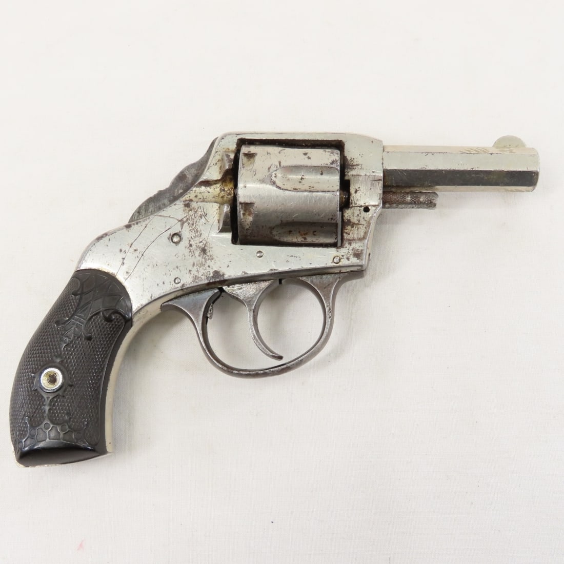 Harrington & Richardson American 38 S&W Revolver: Harrington & Richardson American 38 S&W Revolver - ANTIQUE SN# 1099, "The American", 2.5" octagon barrel with front blade sight, double action, nickel finish,5 shot, broken hammer, not functioning