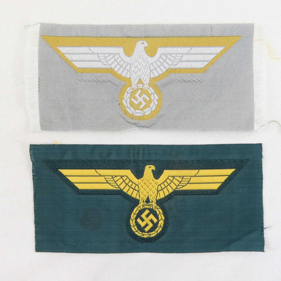2 WWII German Kriegsmarine Cloth Breast Eagle: 2 WWII German Kriegsmarine Cloth Breast Eagle - each measures approx 4 3/4 x 2 1/4" Lot Size 5x3x1" 1 LB All information and photos are intended to be as accurate as possible, but errors are possible.