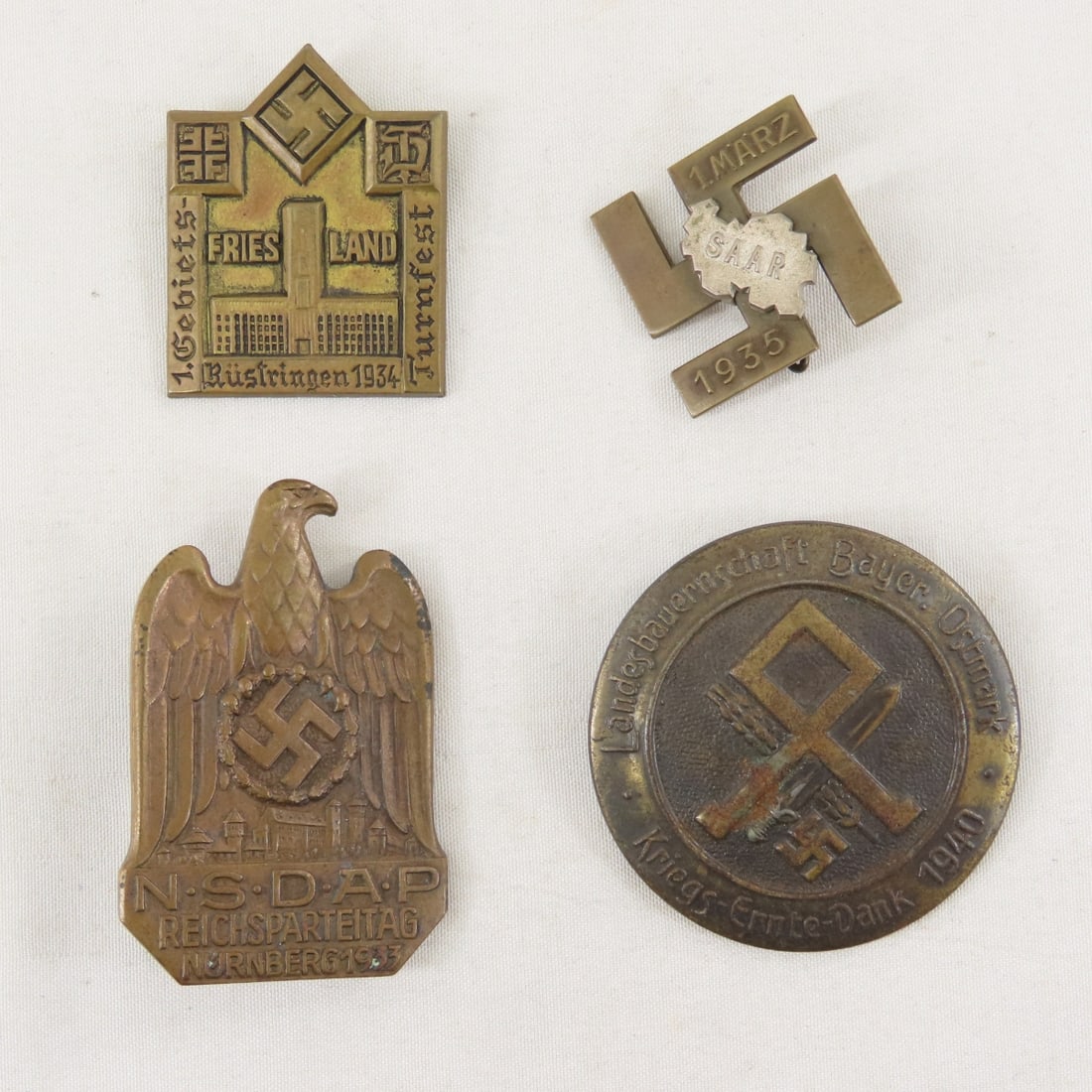 4 WWII German Tinnies: 4 WWII German Tinnies - Lot Size 3x3x3" 1 LB All information and photos are intended to be as accurate as possible, but errors are possible. No item may be returned or refused based on this