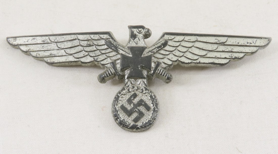 WWII German NSKOV Breast Eagle: WWII German NSKOV Breast Eagle - Lot Size 3x2x1" 1 LB All information and photos are intended to be as accurate as possible, but errors are possible. No item may be returned or refused based on this