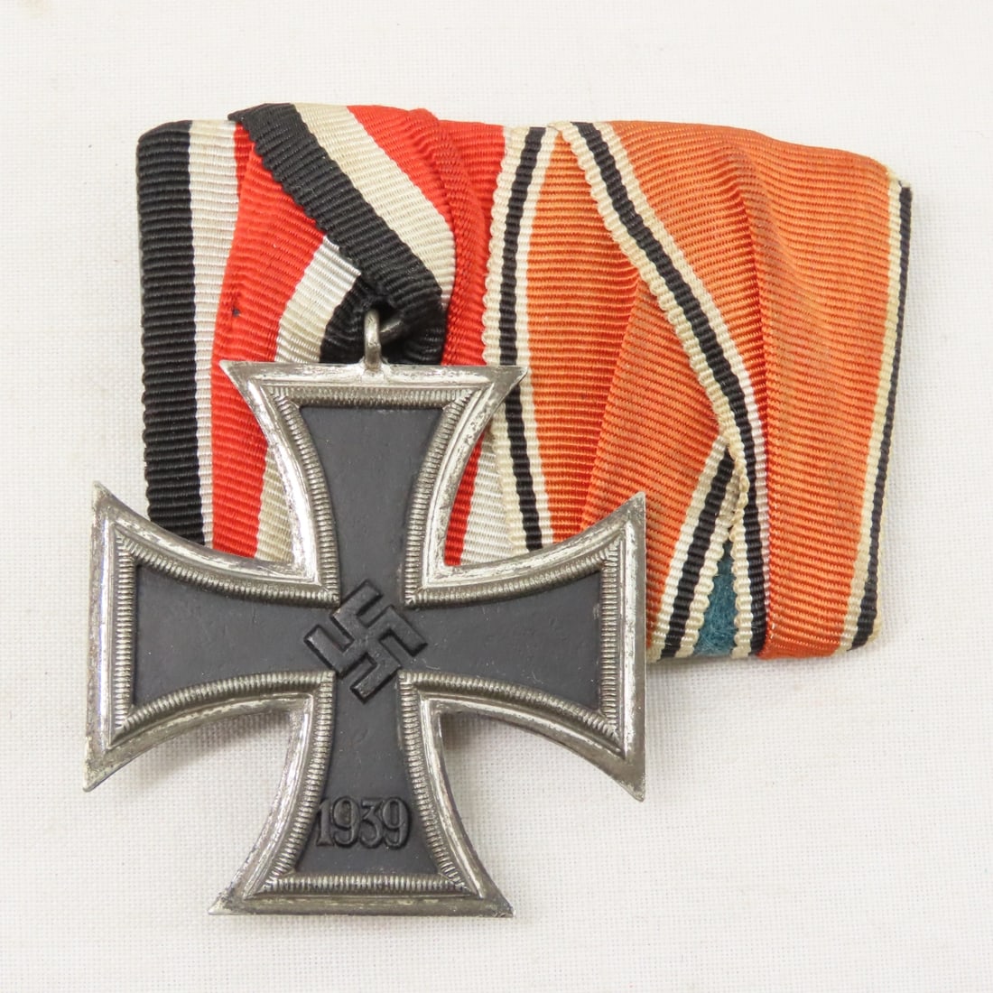 WWII German Iron Cross & Ribbons: WWII German Iron Cross & Ribbons - marked 1939 on one side and 1813 o the other. LOT size: 4x3x1", 1 LB All information and photos are intended to be as accurate as possible, but errors are possible.