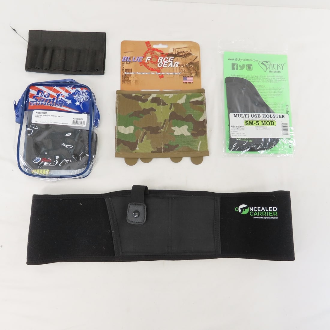 Soft Carry Holsters & accessories, some new: Soft Carry Holsters & accessories, some new - Lot Size 8x8x8" 2 LB All information and photos are intended to be as accurate as possible, but errors are possible. No item may be returned or refused