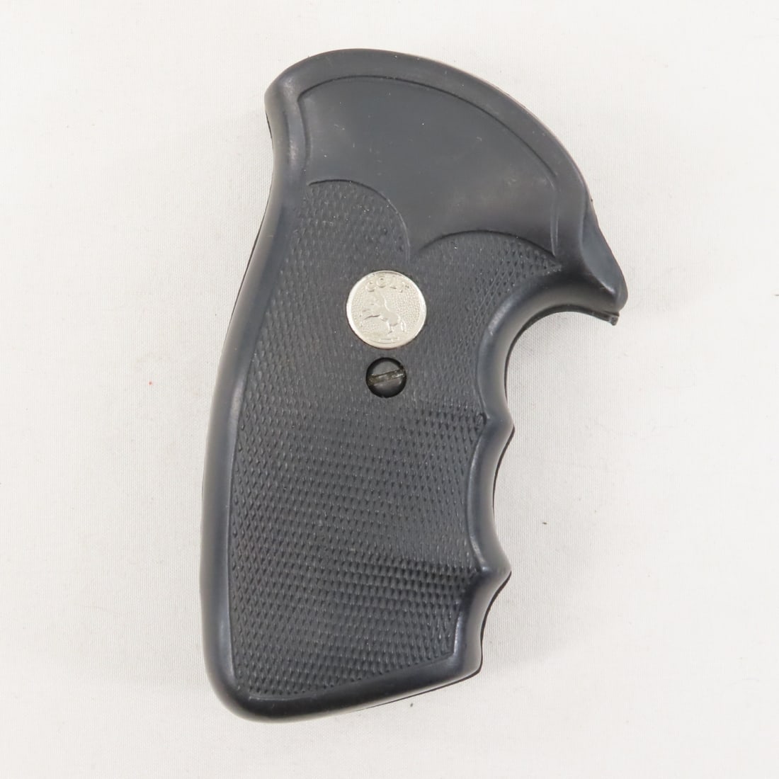 1980’s 2-piece grips for Colt Mark V frame handgun: 1980’s 2-piece grips for Colt Mark V frame handgun - More of a squared-off bottom profile. Textured black rubber with silver Colt emblems. Includes the mounting screw. Very good used