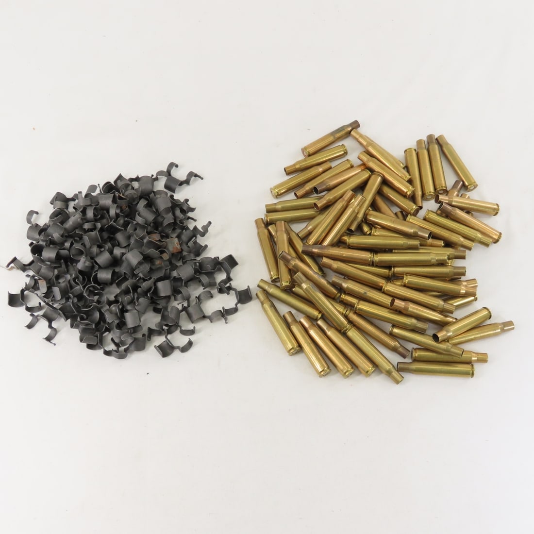 70 Brass .03-06 primed cases & .30 cal links - 2