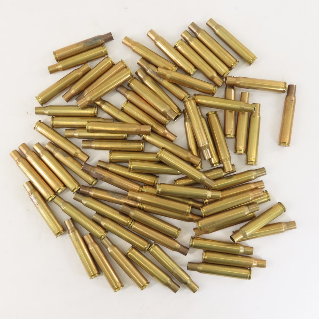 70 Brass .03-06 primed cases & .30 cal links - 3