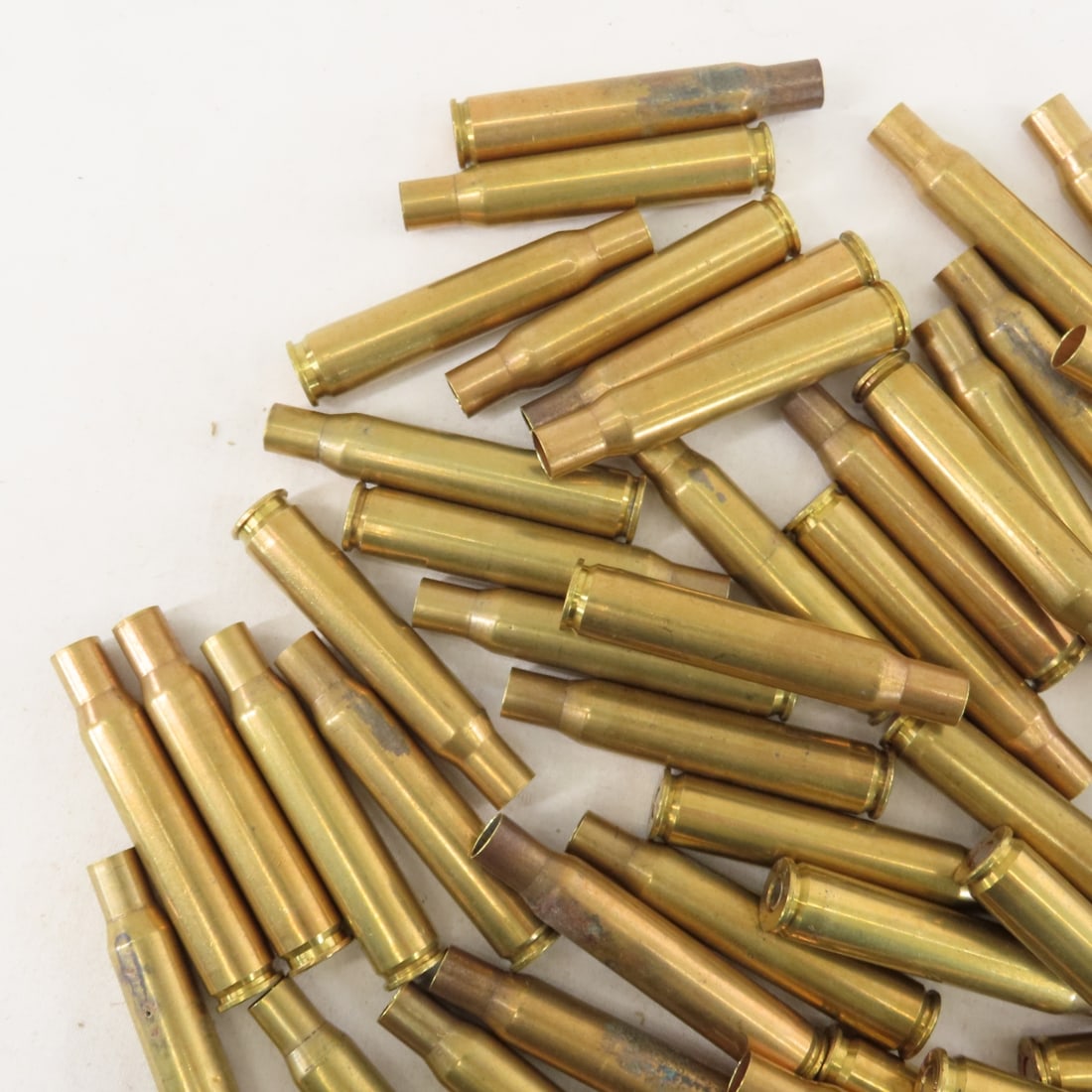 70 Brass .03-06 primed cases & .30 cal links - 4