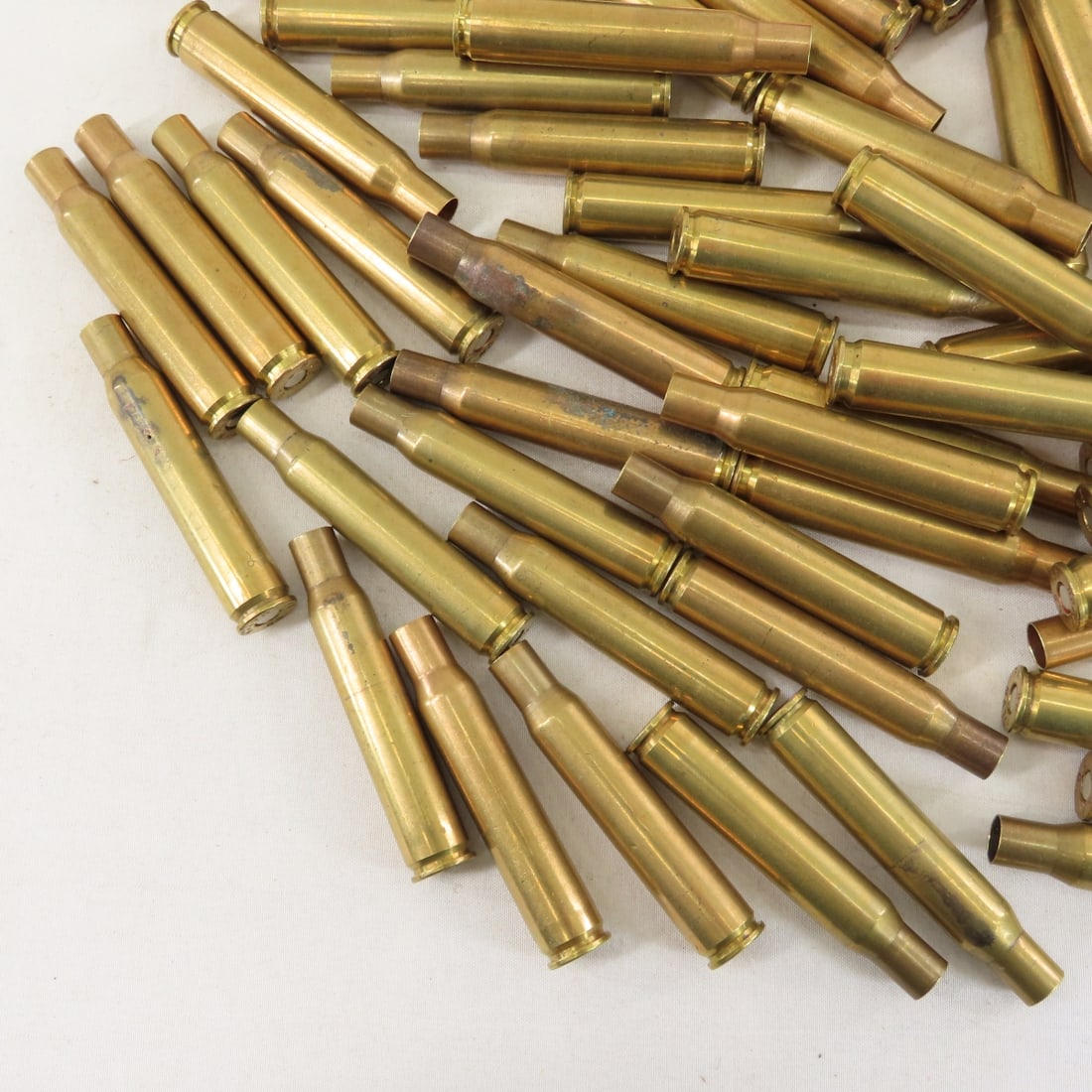 70 Brass .03-06 primed cases & .30 cal links - 7