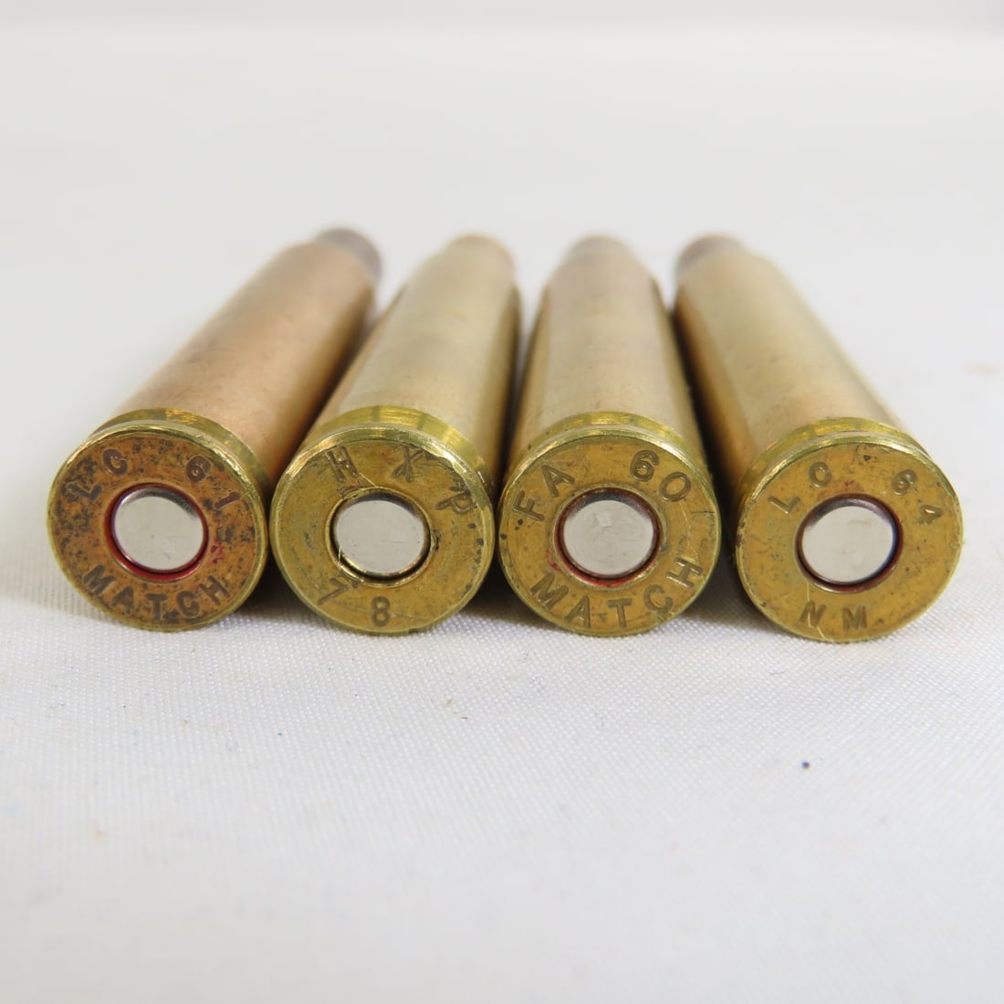 70 Brass .03-06 primed cases & .30 cal links - 8