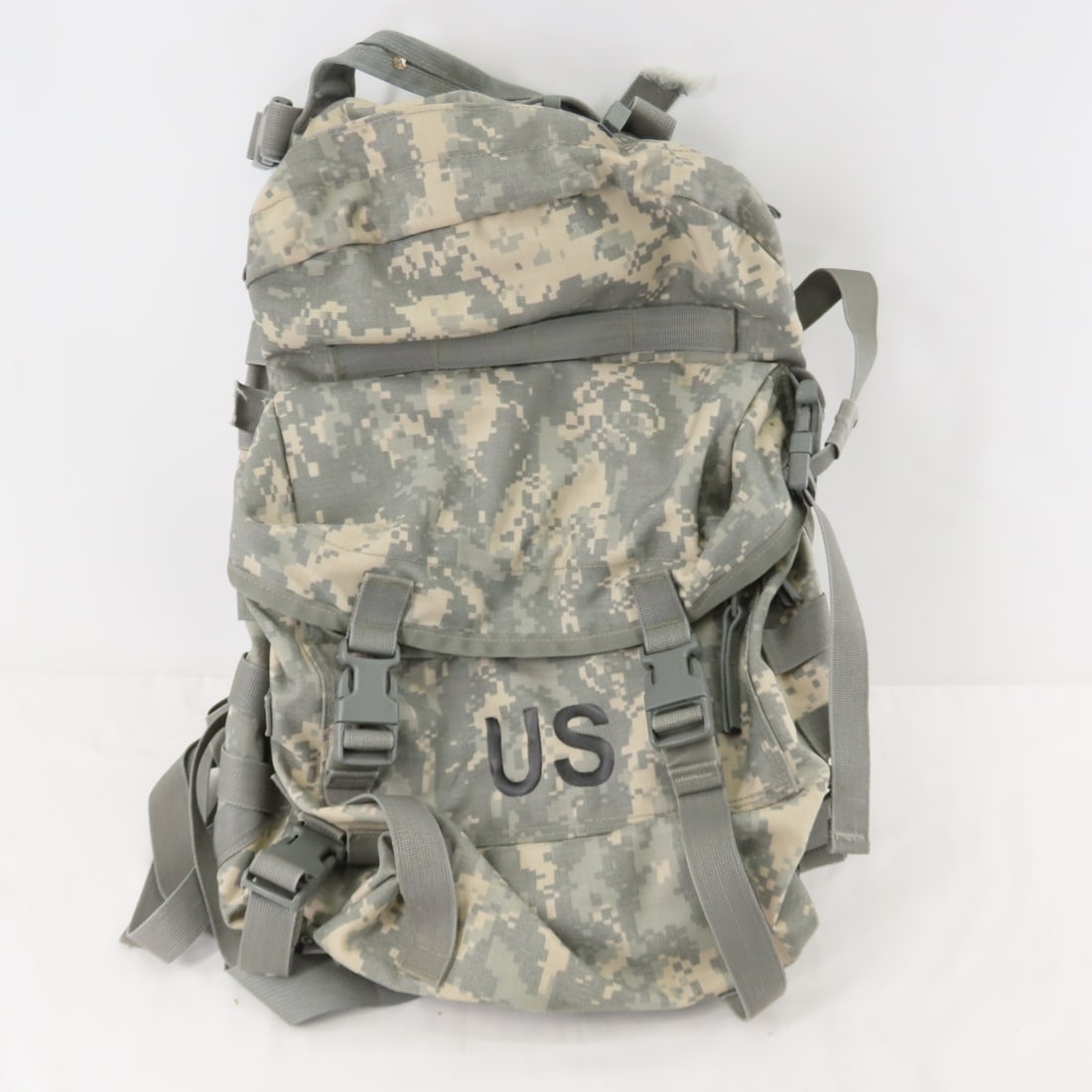 GWOT-era Load Carrying Equipment (MOLLE) II: GWOT-era Load Carrying Equipment (MOLLE) II - Assault Pack (U.S. military back pack). Modular Lightweight Load-carrying Equipment (MOLLE). In green digital camo Nylon construction. Good used
