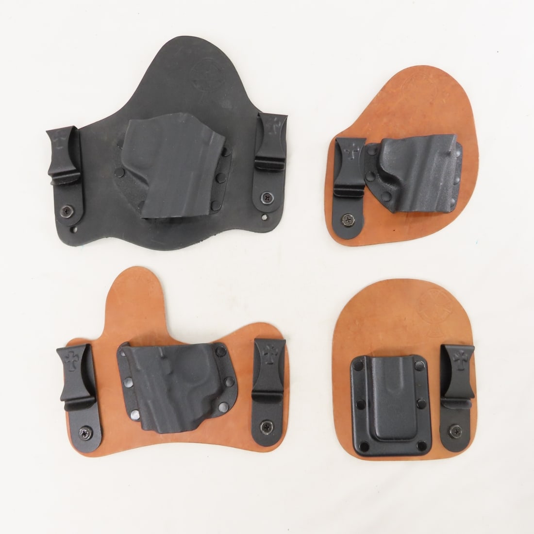 4 Cross Breed Handgun Holsters: 4 Cross Breed Handgun Holsters - Lot Size 10x8x4" 3 LB All information and photos are intended to be as accurate as possible, but errors are possible. No item may be returned or refused based on this