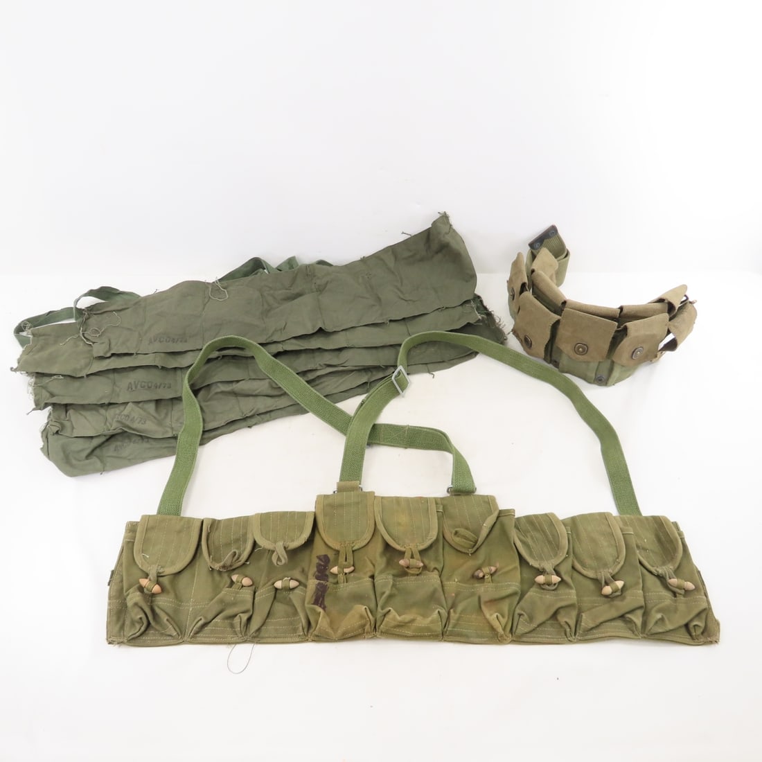 US & Chinese Army Cartridge Belt & Bandoliers: US & Chinese Army Cartridge Belt & Bandoliers - M1 Garand Cartridge Belt Missing 3 Snaps, Chinese Type 56 Chest Rig Ammo Pouch, 5 Vietnam War era Cloth Bandoliers. Lot Size: 12 x 10 x 6", 2 lbs All in