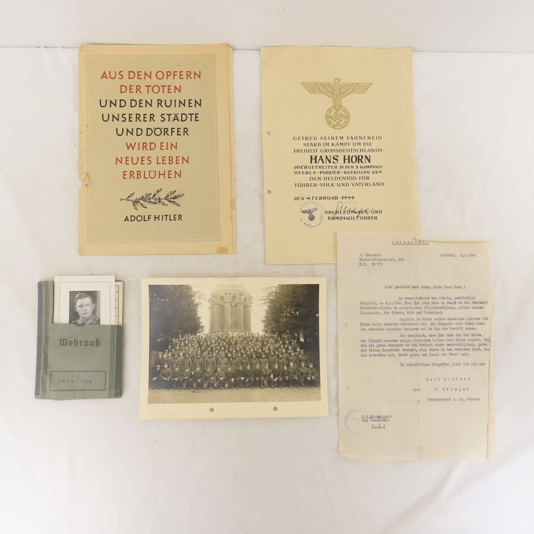 WW2 German Fallen Soldier Death Card, Notification: WW2 German Fallen Soldier Death Card, Notification - WWII Fallen Soldier Hans Horn Credentials, Death Card, Group Photograph and Letter to Family. Lot Size: 12 x 9 x 1", .5" All information and