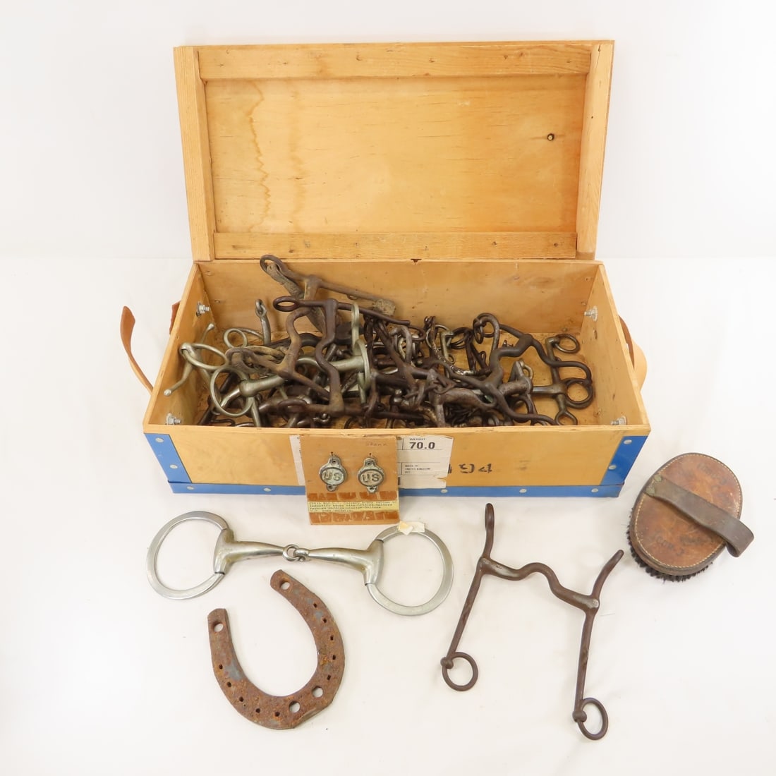 Collection of US Cavalry Horse Bits, Brush & more: Collection of US Cavalry Horse Bits, Brush & more - Bits, Brush & Emblems. Lot Size: 20 x 9 x 6", 22 lbs All information and photos are intended to be as accurate as possible, but errors are