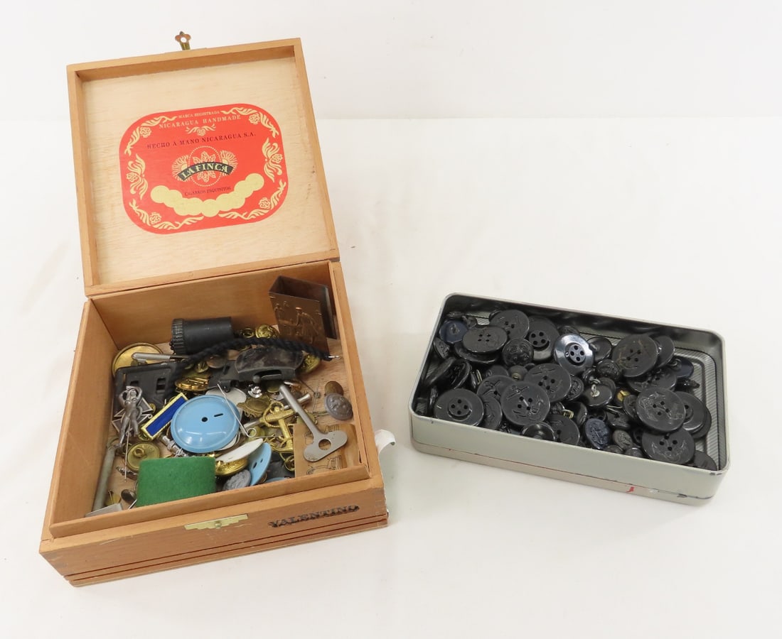 US Military Insignia, US Navy Buttons & More: US Military Insignia, US Navy Buttons & More - copper matchbook cover, keys, non-military pins, nude woman stick pin, and more. LOT SIZE: 9x8x5", 3 lbs All information and photos are intended to be as