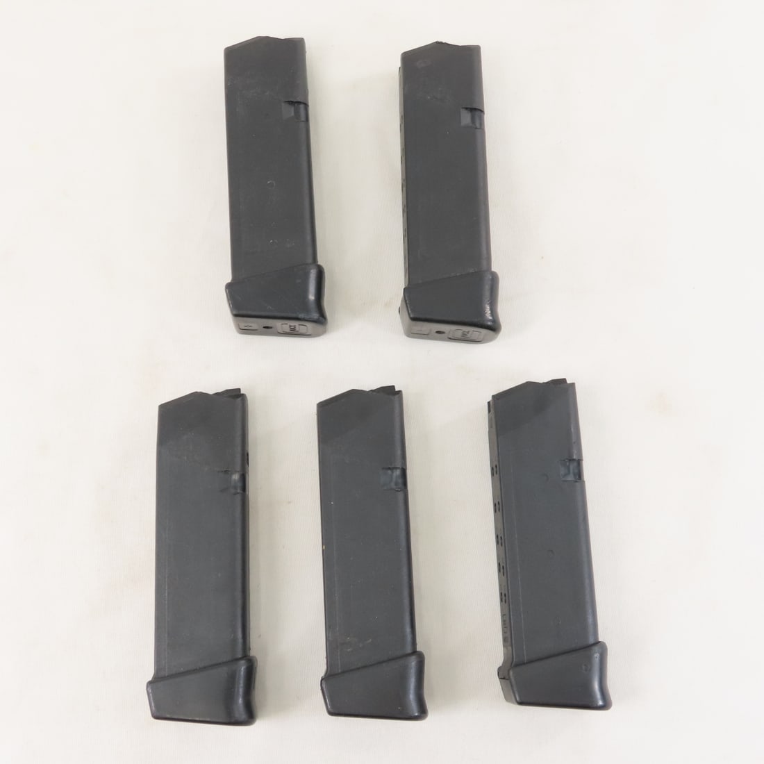 5 Glock 23 Magazines. .40 S&W. 13 rd.: 5 Glock 23 Magazines. .40 S&W. 13 rd. - Glock +1 (+1 rd.) Magazine Extension. LOT SIZE: 5x3x3", 1 lb All information and photos are intended to be as accurate as possible, but errors are possible. No