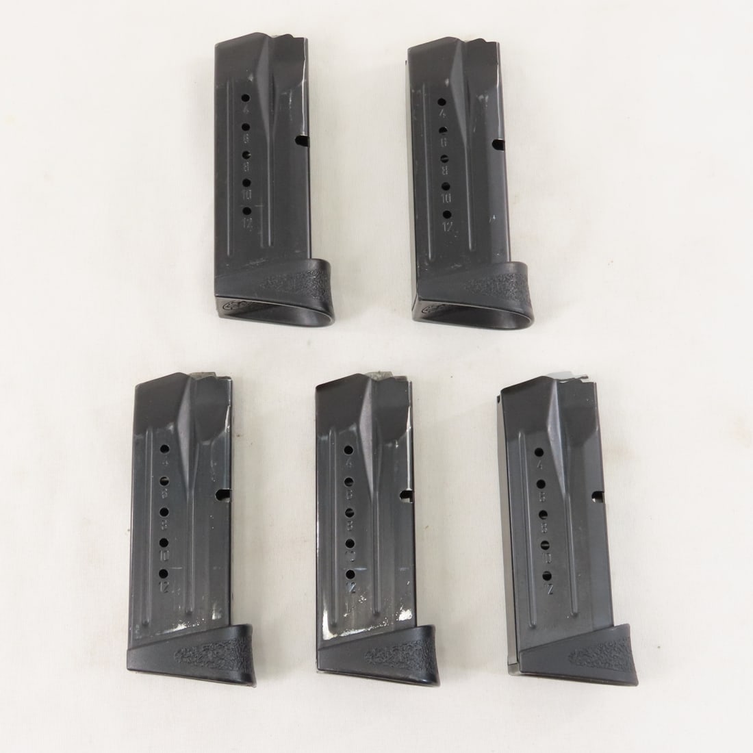 5 Smith & Wesson M&P9 Compact Magazines. 9mm. 12rd: 5 Smith & Wesson M&P9 Compact Magazines. 9mm. 12rd - LOT SIZE: 6x3x2", 1 lb All information and photos are intended to be as accurate as possible, but errors are possible. No item may be returned or