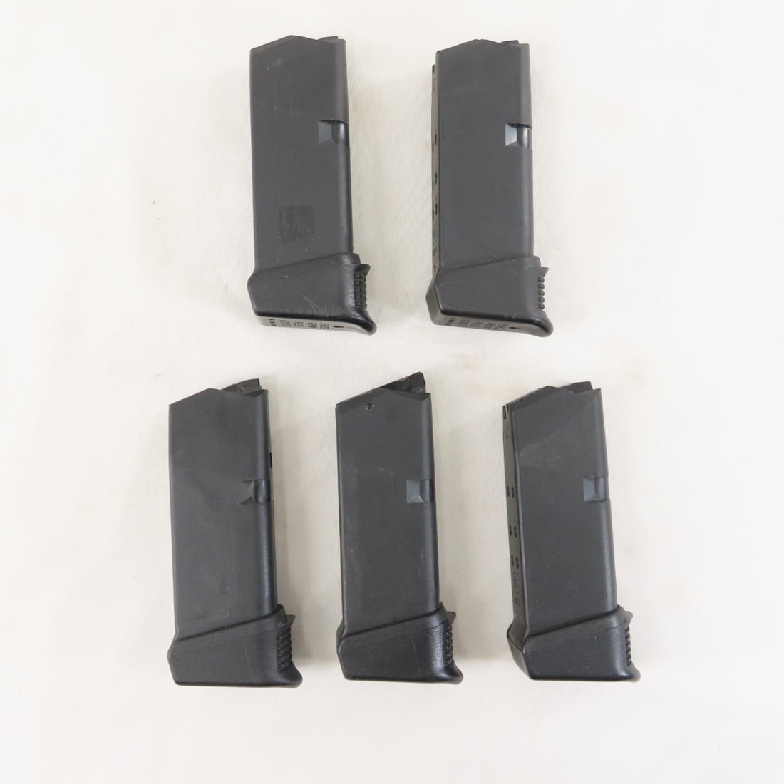 5 Glock 27 Magazines. .40 S&W. 9 rd.: 5 Glock 27 Magazines. .40 S&W. 9 rd. - Pearce PG-39 (+2 rd.) Magazine Extension. LOT SIZE: 6x5x2", 1 lb All information and photos are intended to be as accurate as possible, but errors are possible.