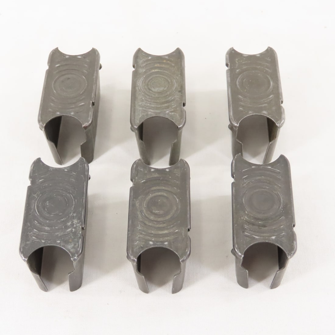 6 M1 Garand En Bloc Clips: 6 M1 Garand En Bloc Clips - LOT SIZE: 4x4x4", 1 LB All information and photos are intended to be as accurate as possible, but errors are possible. No item may be returned or refused based on this info