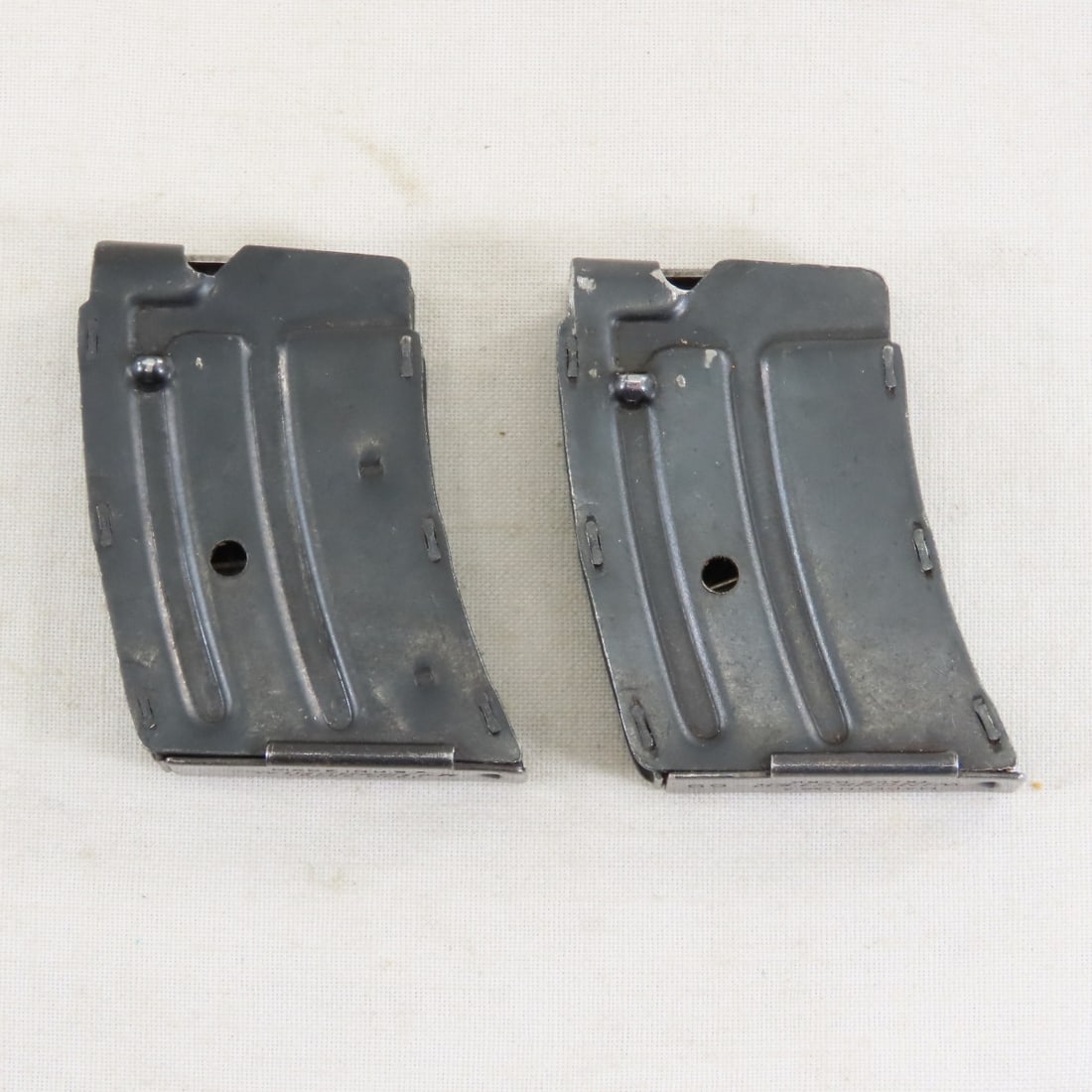 2 Vintage Winchester 52, 69, 69A, 75 .22 Magazines: 2 Vintage Winchester 52, 69, 69A, 75 .22 Magazines - 5 shot, one marked: "Made in USA Winchester Trademark", other marked "Made in USA Winchester-69 Trademark". LOT SIZE: 3x3x2", 1 LB All information