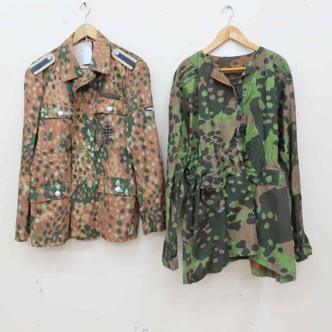 Reenactment German M44 & Waffen SS M42 Smock: Reenactment German M44 & Waffen SS M42 Smock - Both Modern Reproduction Garments & Pins. M44 Pit to Pit 20", Collar to Hem 30", M42 Smock Pit to Pit roughly 24", Collar to Hem 32". Lot Size: 12 x 12