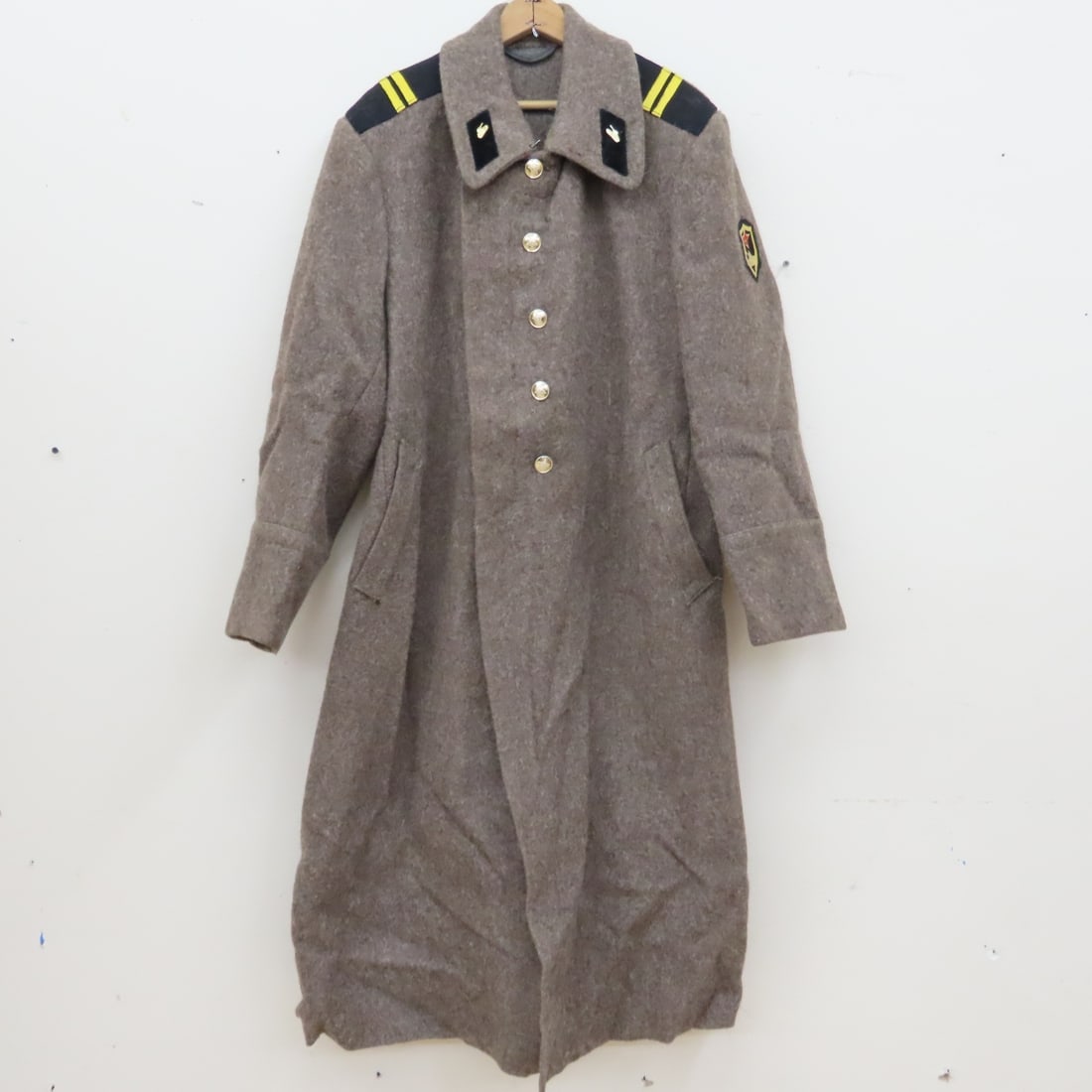 Vintage Soviet Tank Troops Wool Overcoat: Vintage Soviet Tank Troops Wool Overcoat - Factory Stamped 01930, 52-3 and Other handwritten numbers. Pit to Pit: 18", Collar to Hem: 50". Lot Size: 8 lbs All information and photos are intended to be