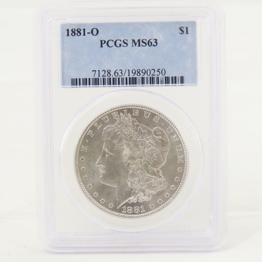 1881 O Morgan Silver Dollar PCGS MS63: 1881 O Morgan Silver Dollar PCGS MS63 - Lot Size 4x3x1" 1 LB All information and photos are intended to be as accurate as possible, but errors are possible. No item may be returned or refused based