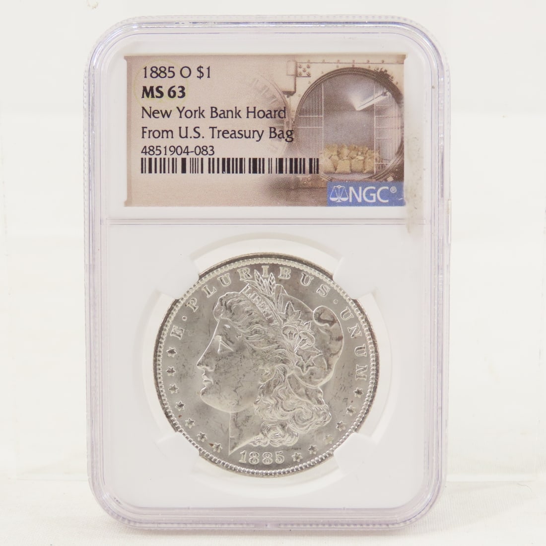 1885 O Morgan Silver Dollar NGC MS63: 1885 O Morgan Silver Dollar NGC MS63 - New York Bank Hoard From U.S. Treasury Bag. Lot Size 4x3x1" 1 LB All information and photos are intended to be as accurate as possible, but errors are possible.