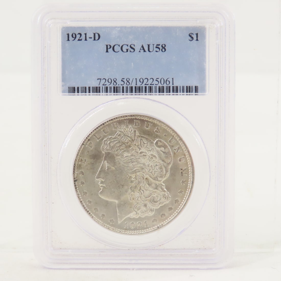1921 D Morgan Silver Dollar PCGS AU58: 1921 D Morgan Silver Dollar PCGS AU58 - Lot Size 4x3x1" 1 LB All information and photos are intended to be as accurate as possible, but errors are possible. No item may be returned or refused based