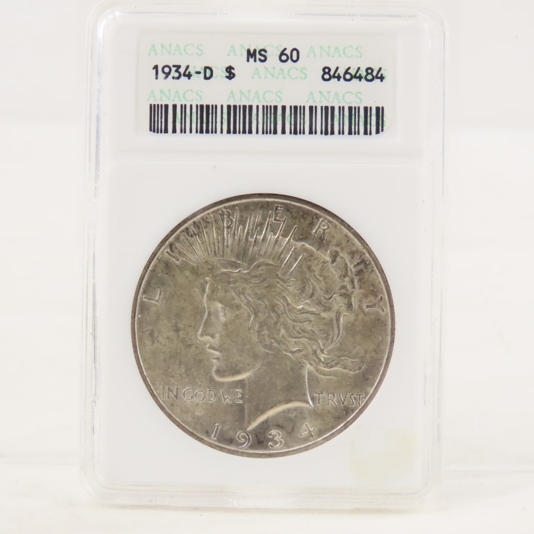 1934 D Peace Silver Dollar ANACS MS60: 1934 D Peace Silver Dollar ANACS MS60 - Lot Size 4x3x1" 1 LB All information and photos are intended to be as accurate as possible, but errors are possible. No item may be returned or refused based on