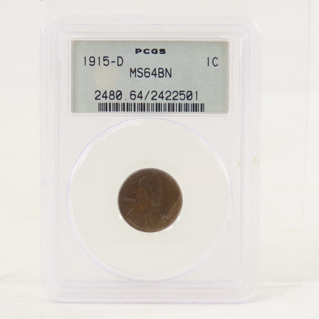 1915 D Lincoln Wheat Cent PCGS MS64BN: 1915 D Lincoln Wheat Cent PCGS MS64BN - Lot Size 4x3x1" 1 LB All information and photos are intended to be as accurate as possible, but errors are possible. No item may be returned or refused based