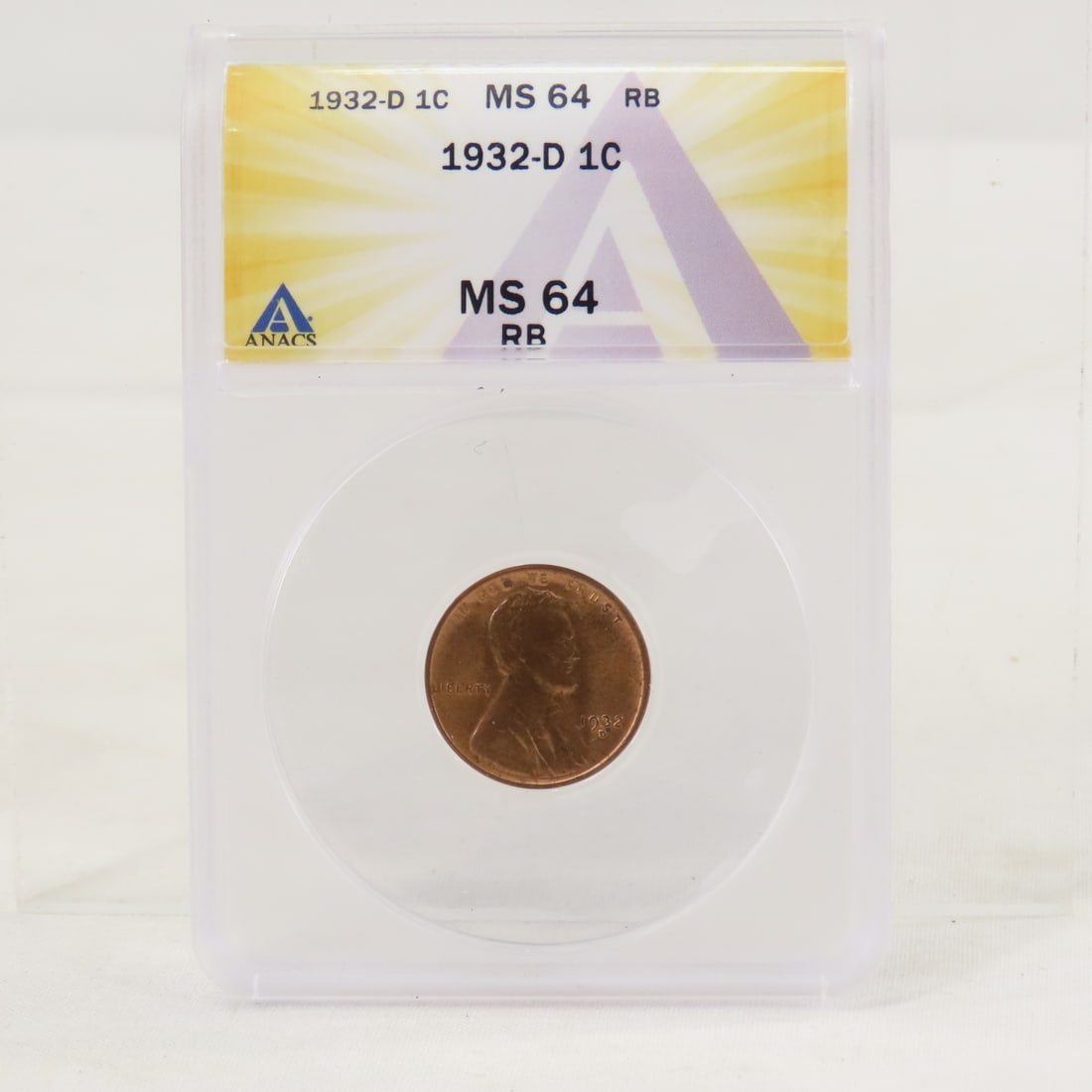 1932 D Lincoln Head Wheat Cent ANACS MS64RB: 1932 D Lincoln Head Wheat Cent ANACS MS64RB - Lot Size 4x3x1" 1 LB All information and photos are intended to be as accurate as possible, but errors are possible. No item may be returned or refused ba