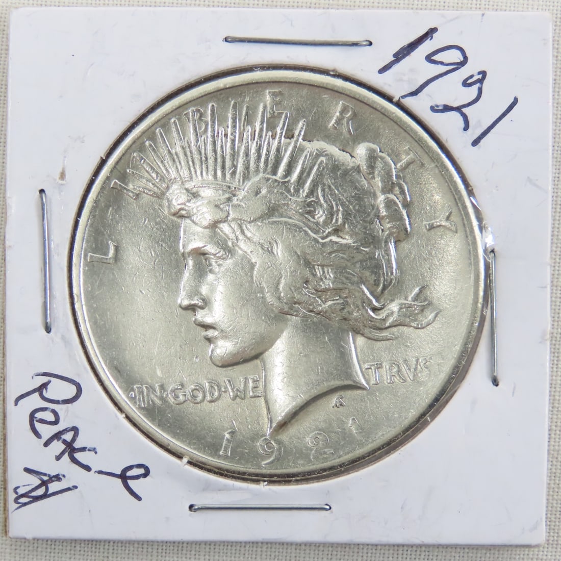 1921 Peace Silver Dollar Key Date: 1921 Peace Silver Dollar Key Date - Lot Size 2x2x2" 1 LB All information and photos are intended to be as accurate as possible, but errors are possible. No item may be returned or refused based on thi