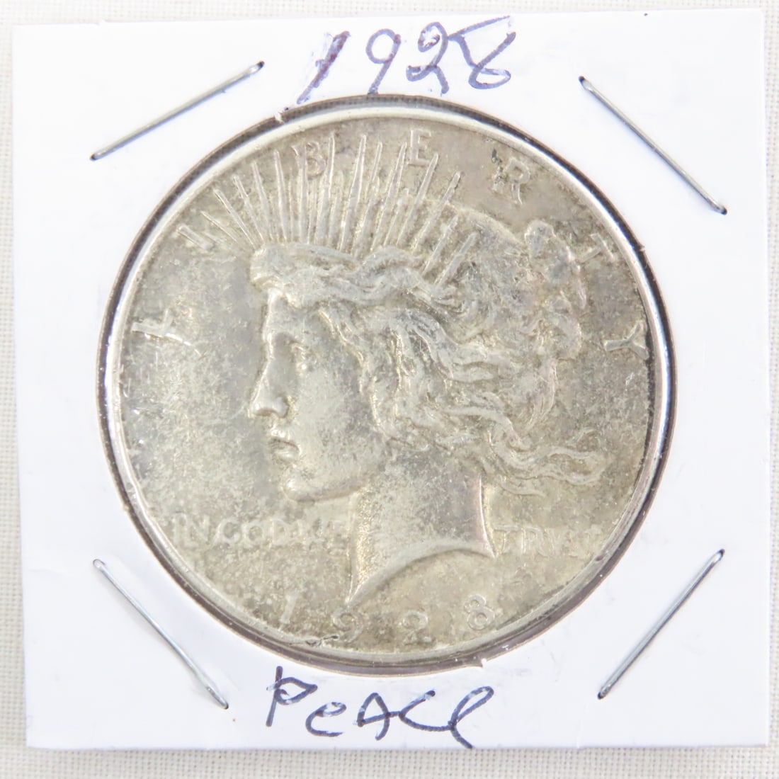 1928 Peace Silver Dollar Key Date: 1928 Peace Silver Dollar Key Date - Lot Size 2x2x2" 1 LB All information and photos are intended to be as accurate as possible, but errors are possible. No item may be returned or refused based on thi