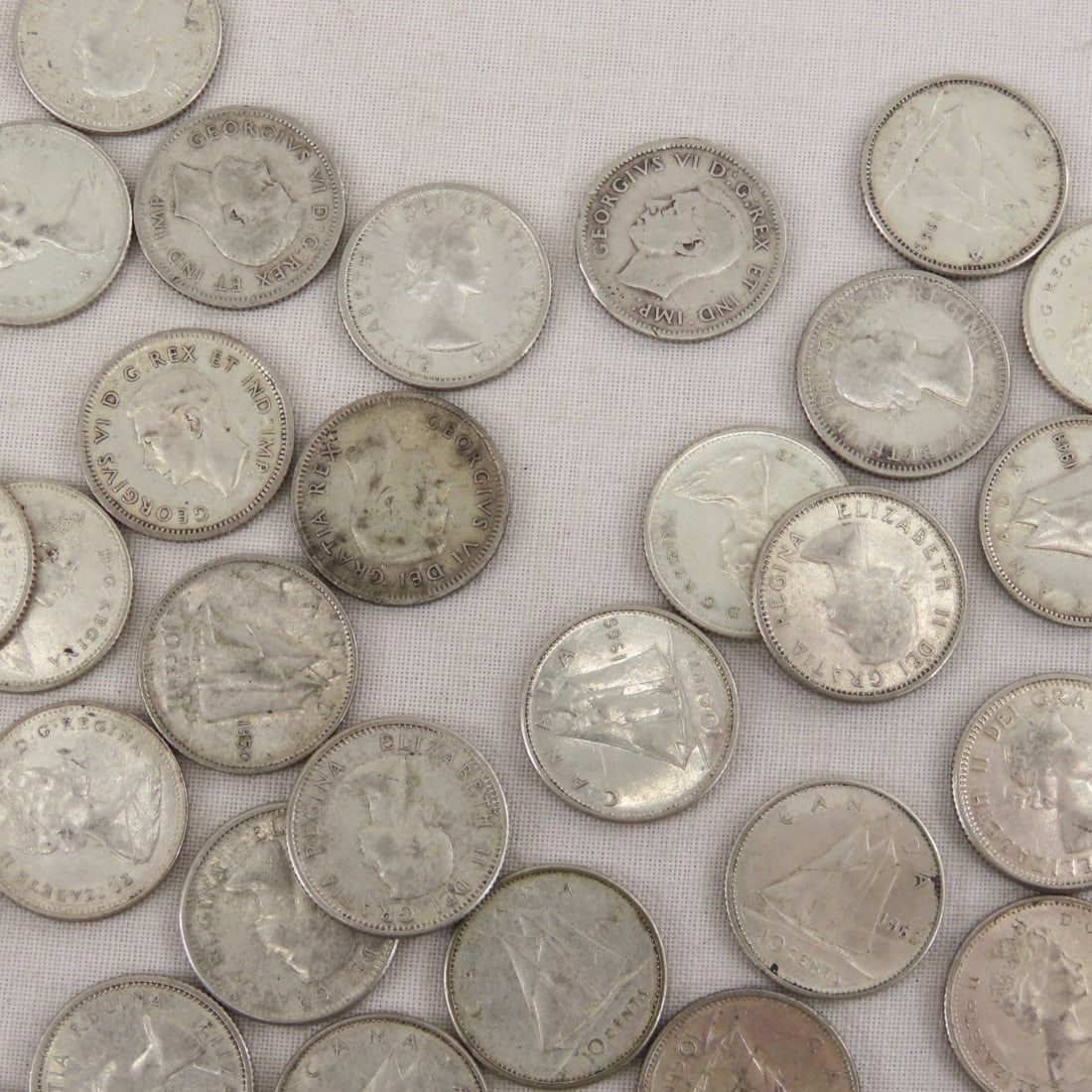 76 1940-1966 Silver Canadian Dimes & 3 1968 - 3