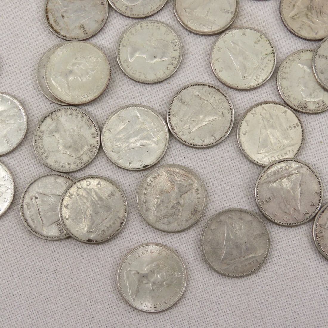 76 1940-1966 Silver Canadian Dimes & 3 1968 - 6