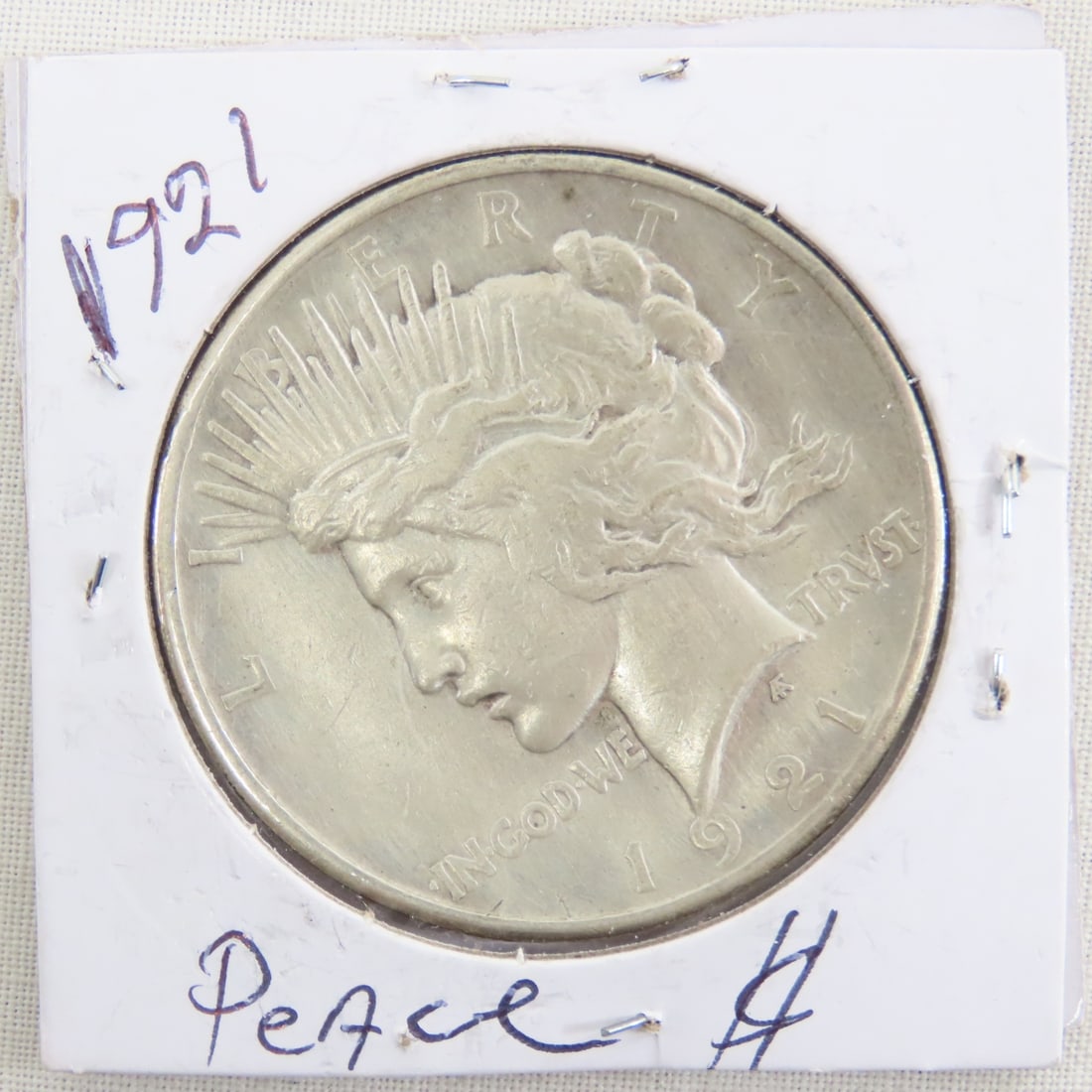 1921 Peace Silver Dollar Key Date: 1921 Peace Silver Dollar Key Date - Lot Size 2x2x2" 1 LB All information and photos are intended to be as accurate as possible, but errors are possible. No item may be returned or refused based on