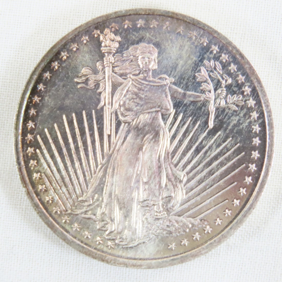 Silver Towne St Gaudens 1ozt .999 Silver Round: Silver Towne St Gaudens 1ozt .999 Silver Round - Lot Size 2x2x1" 1 LB All information and photos are intended to be as accurate as possible, but errors are possible. No item may be returned or