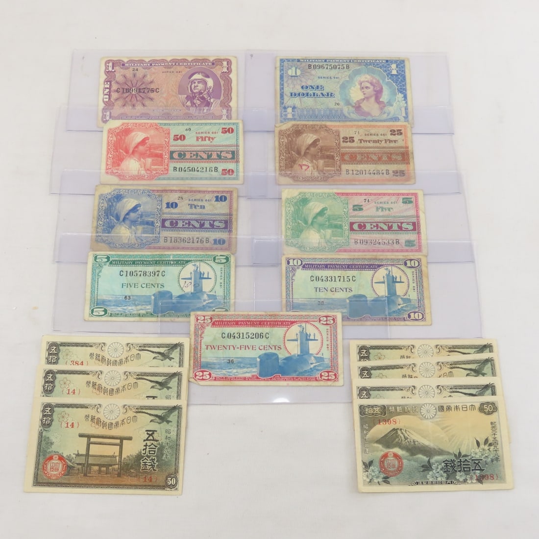 WWII Military Payment Certificates & more: WWII Military Payment Certificates & more - 7 crisp 50 Sen notes. Lot Size 8x4x1" 1 LB All information and photos are intended to be as accurate as possible, but errors are possible. No item may be