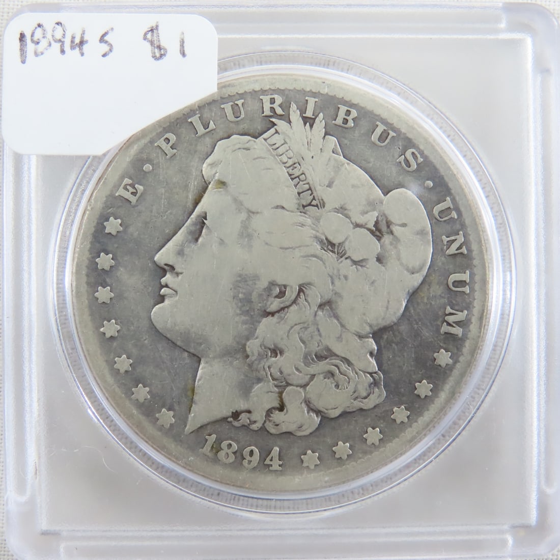 1894 S Morgan Silver Dollar: 1894 S Morgan Silver Dollar - Lot Size 2x2x1" 1 LB All information and photos are intended to be as accurate as possible, but errors are possible. No item may be returned or refused based on this info