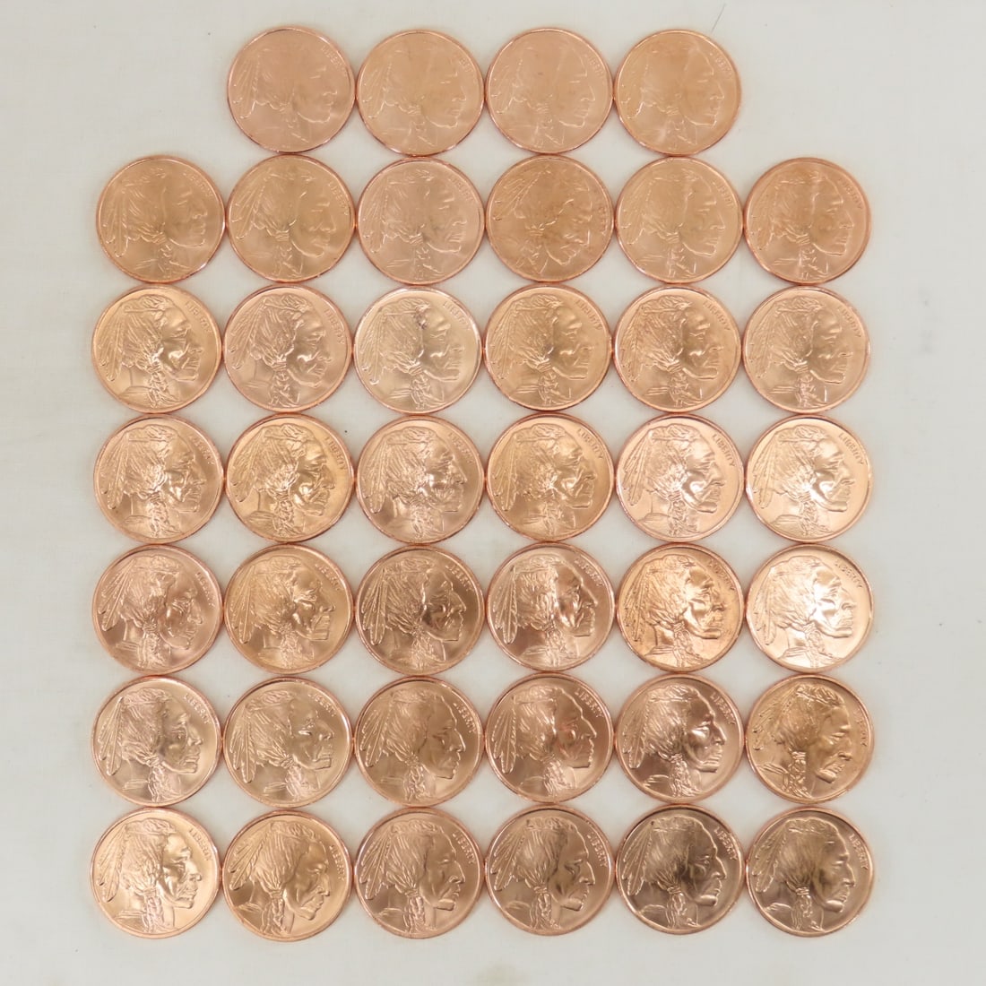 40 1ozt Copper Indian Head Buffalo Rounds: 40 1ozt Copper Indian Head Buffalo Rounds - Lot Size 4x3x2" 3 LB All information and photos are intended to be as accurate as possible, but errors are possible. No item may be returned or refused