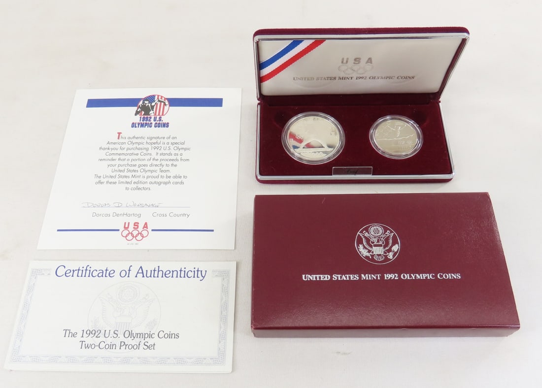 1992 S Olympic Silver Dollar & Half Dollar Proof: 1992 S Olympic Silver Dollar & Half Dollar Proof - with box and papers. Lot Size 6x4x1" 1 LB All information and photos are intended to be as accurate as possible, but errors are possible. No item