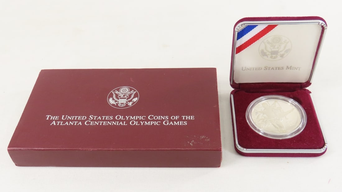 1995 S Atlanta Centennial Olympic Silver Dollar: 1995 S Atlanta Centennial Olympic Silver Dollar - Proof Coin with box and papers. Lot Size 6x4x1" 1 LB All information and photos are intended to be as accurate as possible, but errors are possible.