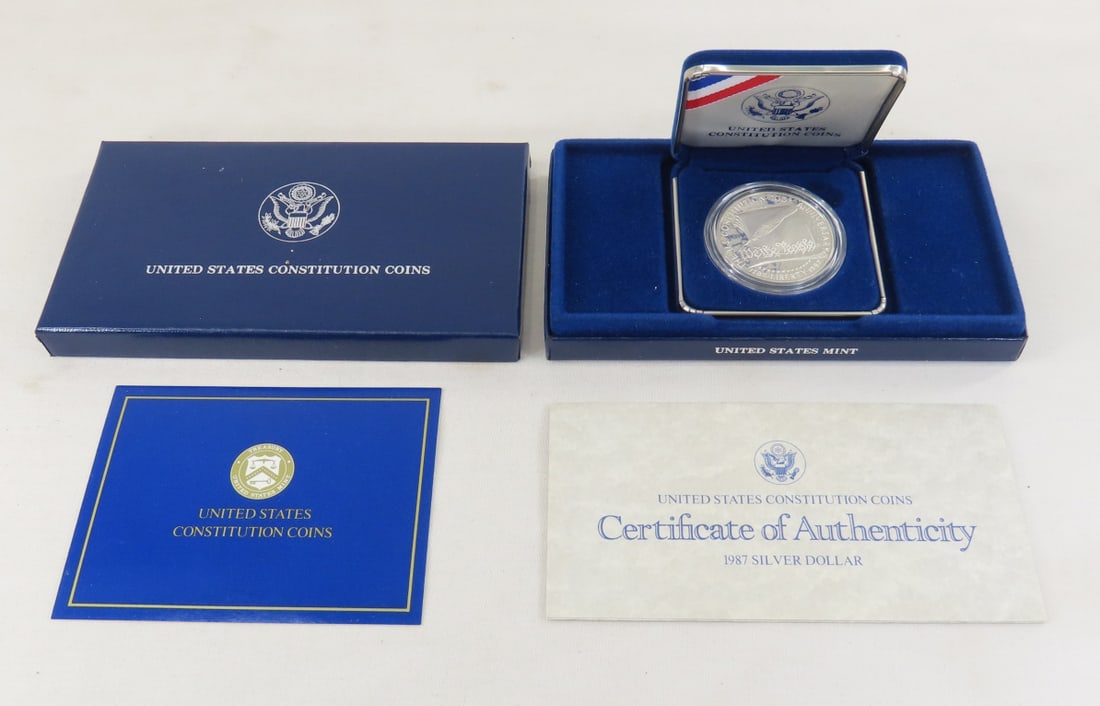 1987 S US Constitution Silver Dollar Proof: 1987 S US Constitution Silver Dollar Proof - with box and papers. Lot Size 6x4x1" 1 LB All information and photos are intended to be as accurate as possible, but errors are possible. No item may be