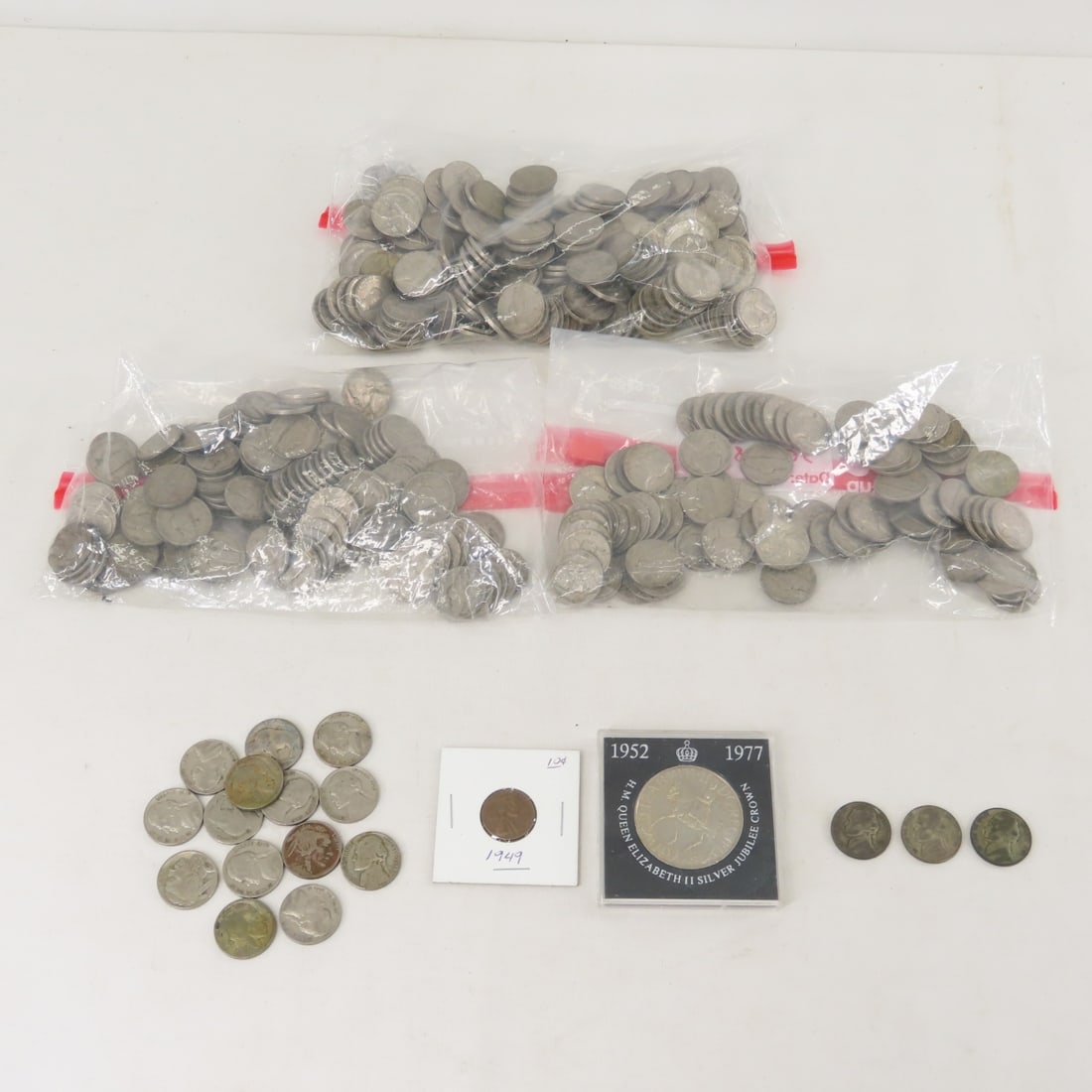 Nickels, QEII Jubilee Crown Coin & More: Nickels, QEII Jubilee Crown Coin & More - 6 buffalo nickels, 8 1939 nickels, 3 silver war nickels, 125 1940's nickels, 83 1950's nickels, 178 1960's nickels, and 1 1949 wheat cent. LOT SIZE: 6x6x6" 5 