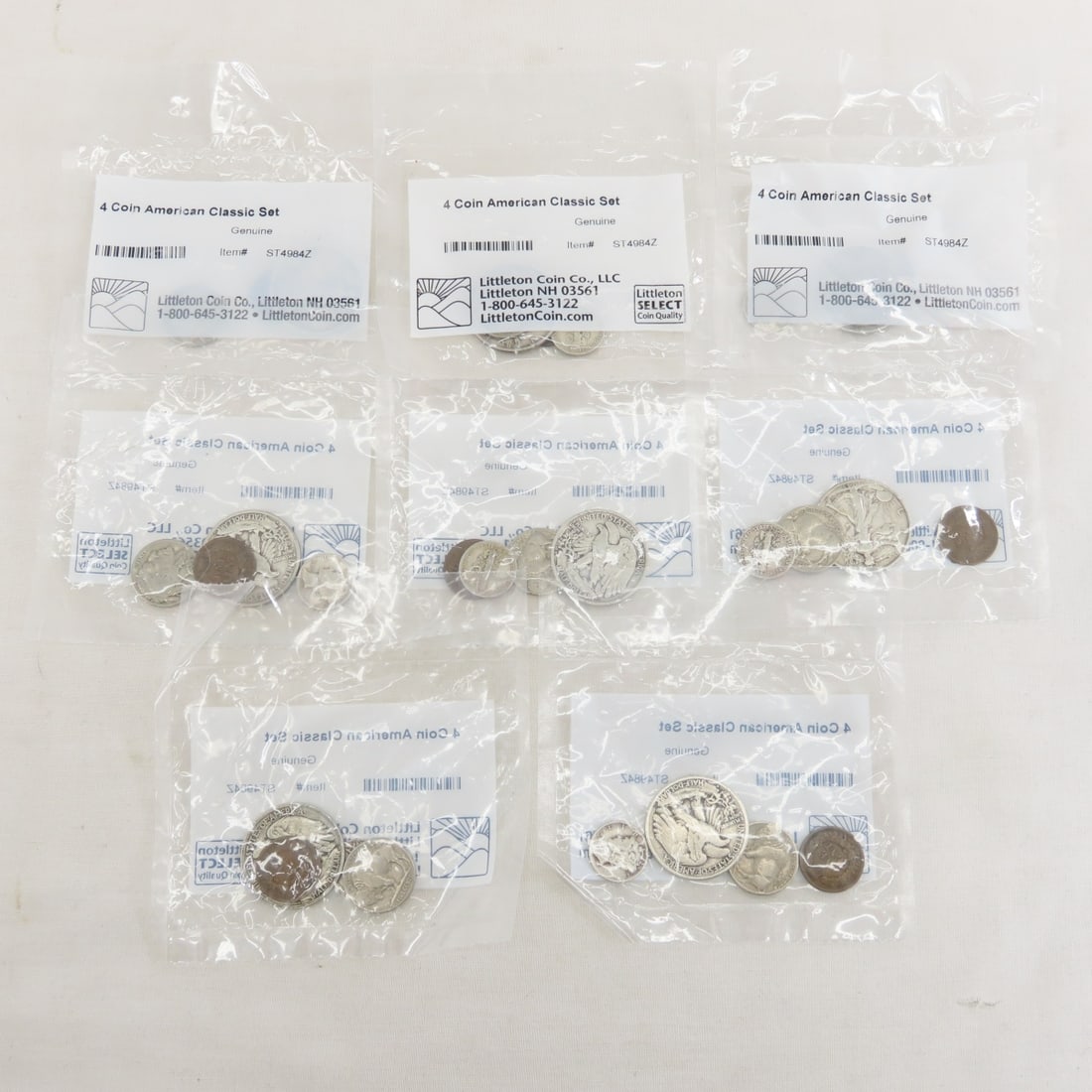 8 Littleton 4 Coin American Classic Sets: 8 Littleton 4 Coin American Classic Sets - Each set has 1 each Walking Liberty Half Dollar, Mercury Dime, Buffalo Nickel, Indian Head Cent, $4.80 face 90% US Silver. Lot Size 3x3x3" 2 LB All informati