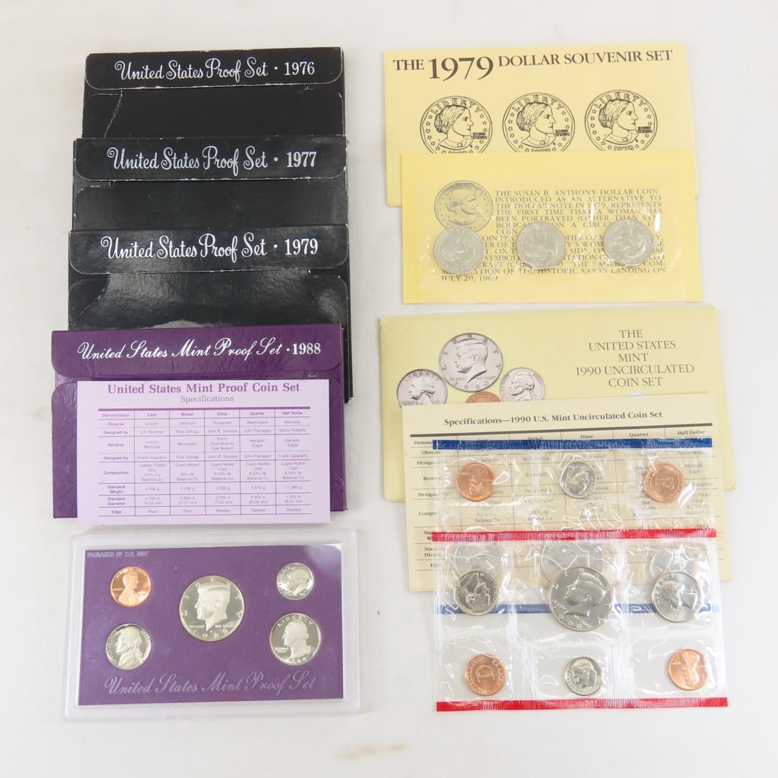 US Proof & Mint sets. 1976,1978,1979,1988 Proof: US Proof & Mint sets. 1976,1978,1979,1988 Proof - 1990 uncirculated set & 1979 Susan B Anthony 3 $1 Coin set. Lot Size 7x4x3" 3 LB All information and photos are intended to be as accurate as