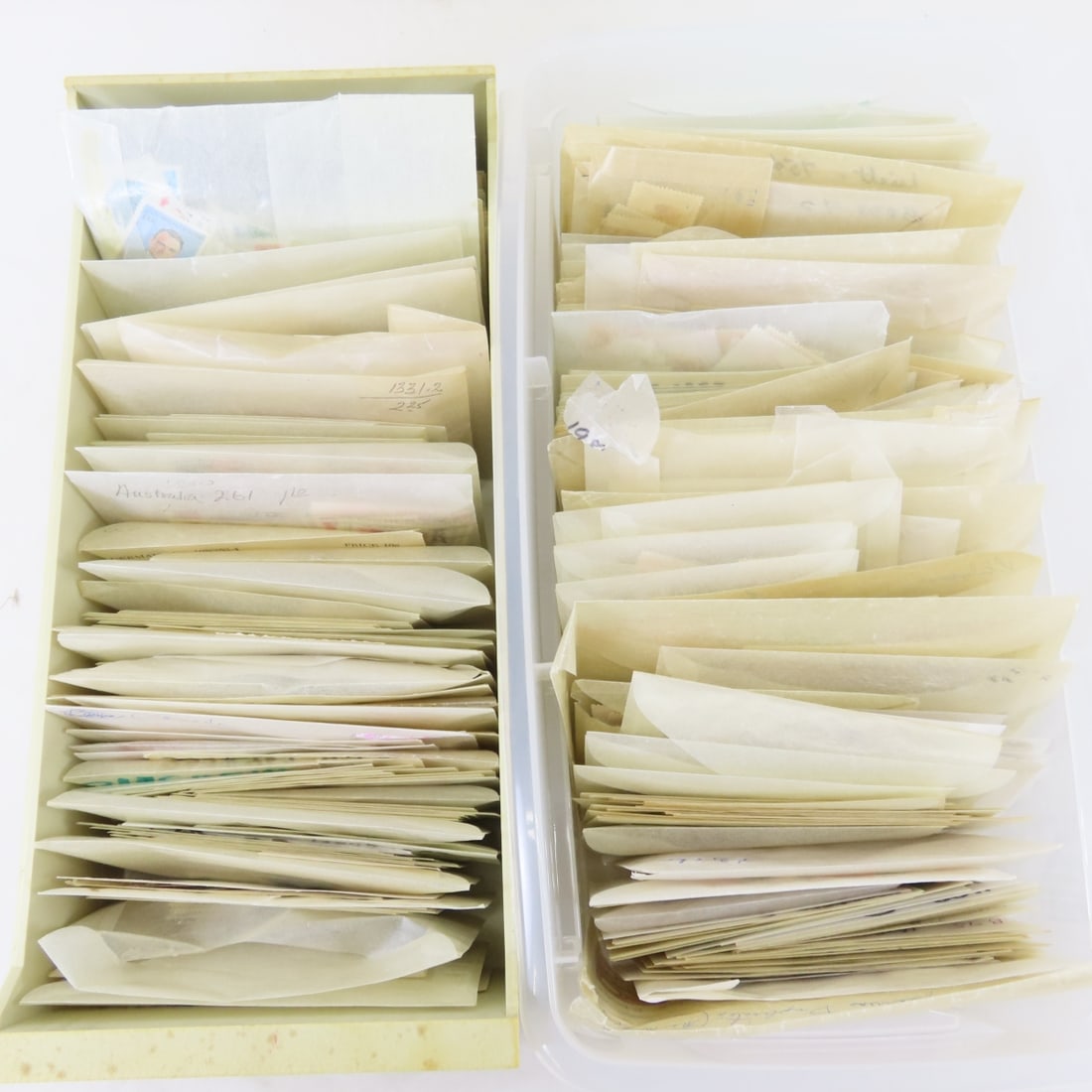 Collection of World Stamps in Glassine Envelopes: Collection of World Stamps in Glassine Envelopes - Countries A-Z & Box of Russian Stamps in Glassine Envelopes mostly sorted and identified, but some unsorted envelopes. LOT SIZE: 13x10x8", 5 LBS All 
