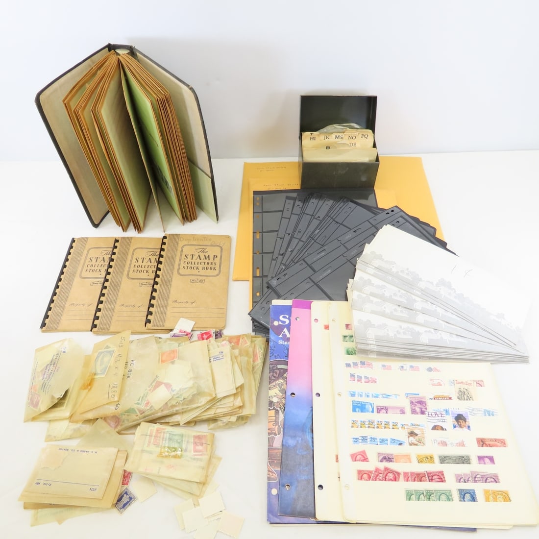 Collection of Mostly US Stamps in Stock Pages: Collection of Mostly US Stamps in Stock Pages - LOT SIZE: 12x10x9", 9 LBS All information and photos are intended to be as accurate as possible, but errors are possible. No item may be returned or